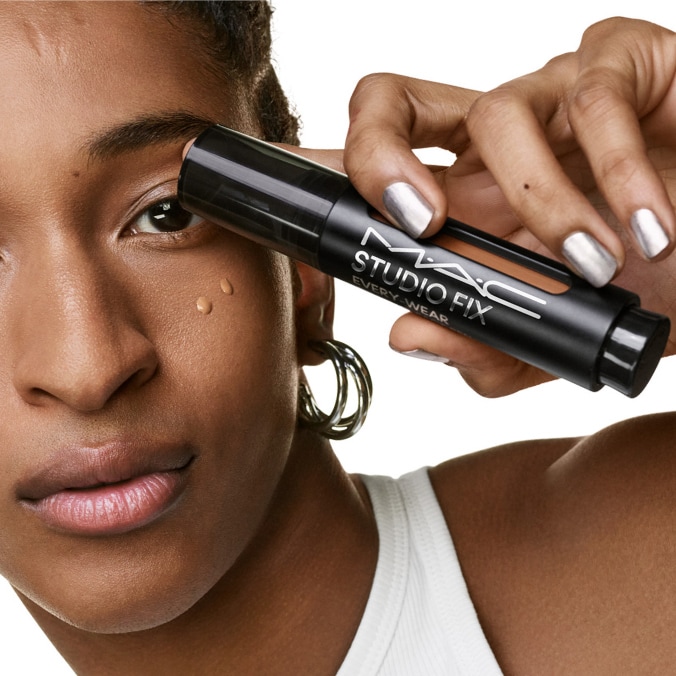 Model with MAC Cosmetics product